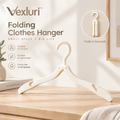 Vexluri™ Portable Folding Clothes Hanger – Compact, Lightweight Travel Hanger for Small Spaces